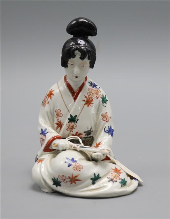 A Japanese Arita figure of a bijin, height 15.5cm